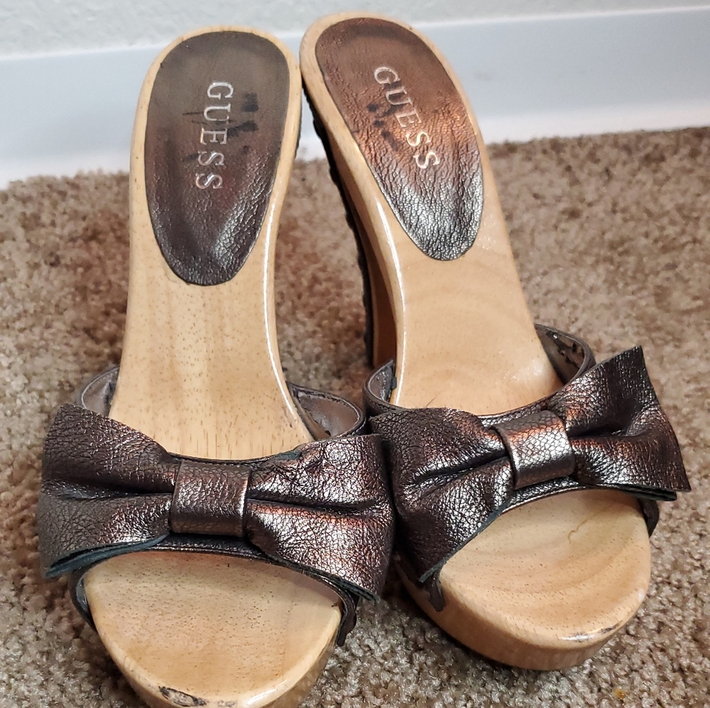 Cute Guess wooden slide in high heels